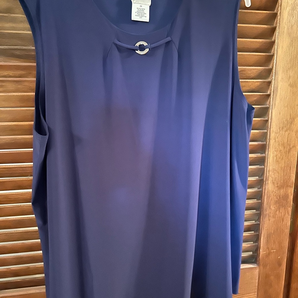 Elegant Sleeveless Top with Silver Accent